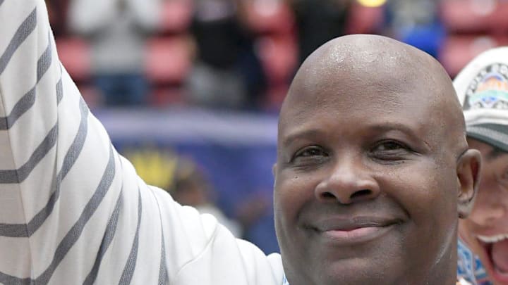 Winter Haven head coach Johnnie Lawson holds up the State Championship trophy after his team defeated Dr. Phillips during the class 7A final in the FHSAA Basketball State Championships at the RP Funding Center in Lakeland, Fl on Saturday March 8, 2025. Winter Haven defeated Dr. Phillips 45-42 to win the State Championship. 

Scott Wheeler | PhotoWinter Haven's (13) shoots against Dr. Phillips' (3) during the class 7A final in the FHSAA Basketball State Championships at the RP Funding Center in