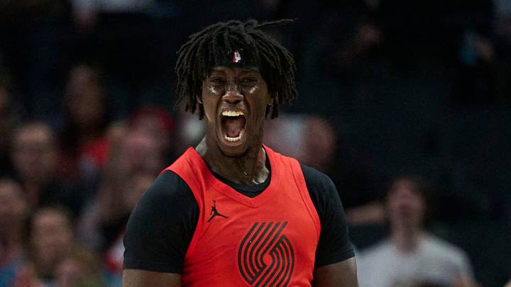 Jan 9, 2026; Portland, Oregon, USA; Portland Trail Blazers guard Sidy Cissoko (91) celebrates after scoring a three point basket during the first half against Houston Rockets forward Jabari Smith Jr. (10) at Moda Center. Mandatory Credit: Troy Wayrynen-Imagn Images Jan 9, 2026; Portland, Oregon, USA; Portland Trail Blazers guard Sidy Cissoko (91) celebrates after scoring a three point basket during the first half against Houston Rockets forward Jabari Smith Jr. (10) at Moda Center. Mandatory Credit: Troy Wayrynen-Imagn Images