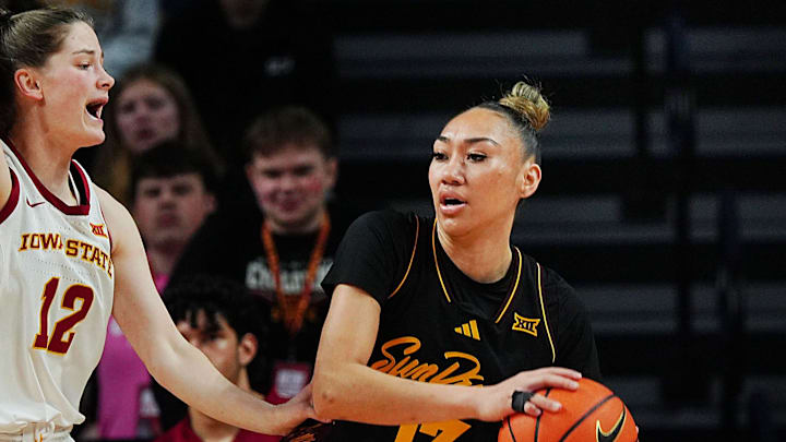 Iowa State Cyclones' guard Kenzie Hare (12) puts high pressure on Arizona State Sun Devils guard Last-Tear Poa (13) during the fourth quarter in the Big-12 women’s basketball at Hilton Coliseum on Feb. 18, 2026, in Ames, Iowa