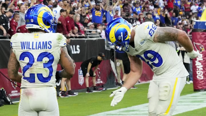 Los Angeles Rams tight end Tyler Higbee (89) reacts after a touchdown by running back Kyren Williams (23) against the Arizona Cardinals in the second half at State Farm Stadium in Glendale on Nov. 26, 2023.