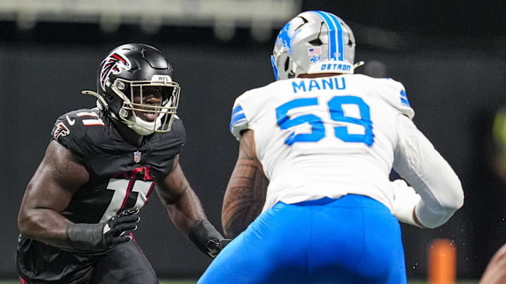 Atlanta Falcons linebacker Jalon Walker (11) works against Detroit Lions offensive tackle Giovanni Manu (59) 