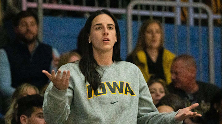 Former Iowa women's basketball player Caitlin Clark reacts after a foul call on Iowa during the Drake vs. Iowa basketball game at Knapp Center on Sunday, Nov. 17, 2024, in Des Moines.