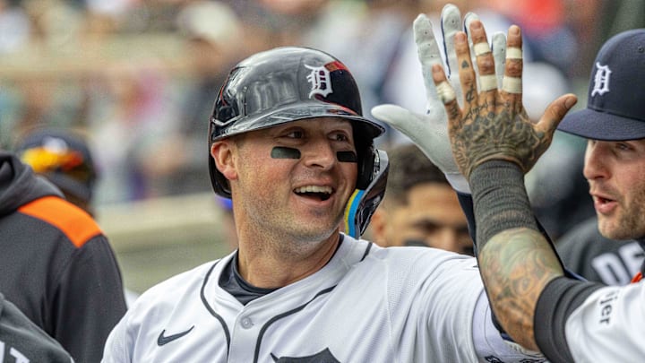 Apr 26, 2025; Detroit, Michigan, USA; Detroit Tigers first base Spencer Torkelson (20) celebrates with teammates in the dugout after hitting a solo home run against Baltimore Orioles pitcher Matt Bowman (51) in the seventh inning during game one of a double header at Comerica Park. 