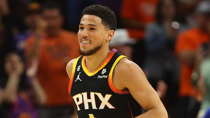 Apr 25, 2023; Phoenix, Arizona, USA; Phoenix Suns guards Devin Booker (1) smiles after a shot against the Los Angeles Clippers during the first half in game five of the 2023 NBA playoffs at Footprint Center. Mandatory Credit: Mark J. Rebilas-USA TODAY Sports Apr 25, 2023; Phoenix, Arizona, USA; Phoenix Suns guards Devin Booker (1) smiles after a shot against the Los Angeles Clippers during the first half in game five of the 2023 NBA playoffs at Footprint Center. Mandatory Credit: Mark J. Rebilas-USA TODAY Sports