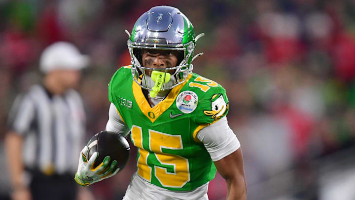 Jan 1, 2025; Pasadena, CA, USA; Oregon Ducks wide receiver Tez Johnson (15) runs against the Ohio State Buckeyes in the second half  in the 2025 Rose Bowl college football quarterfinal game at Rose Bowl Stadium. Mandatory Credit: Gary A. Vasquez-Imagn Images