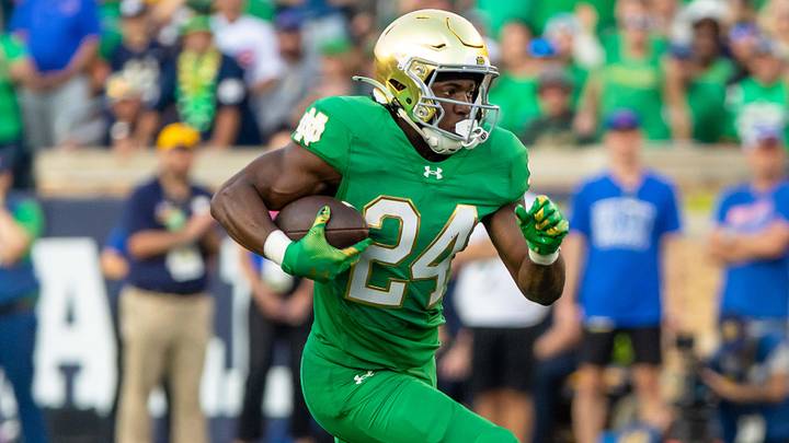 Notre Dame Fighting Irish running back Jadarian Price runs the ball against the Boise State Broncos at Notre Dame Stadium. Notre Dame Fighting Irish running back Jadarian Price runs the ball against the Boise State Broncos at Notre Dame Stadium.
