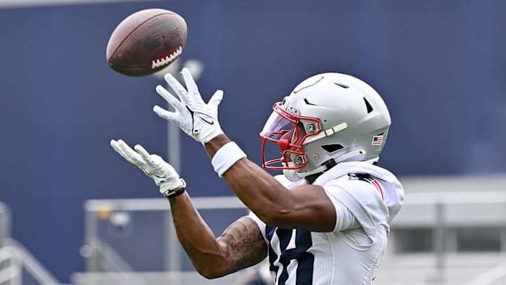 Jun 9, 2025; Foxborough, MA, USA; New England Patriots wide receiver Kyle Williams (18) makes a catch during minicamp at Gillette Stadium. Mandatory Credit: Eric Canha-Imagn Images