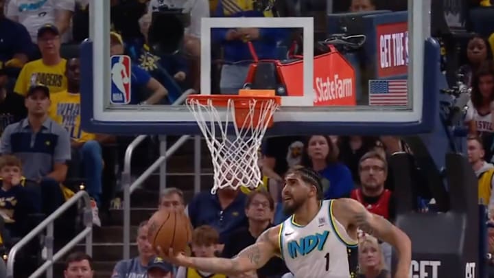 Obi Toppin hits a tough reverse layup against the Cleveland Cavaliers. 