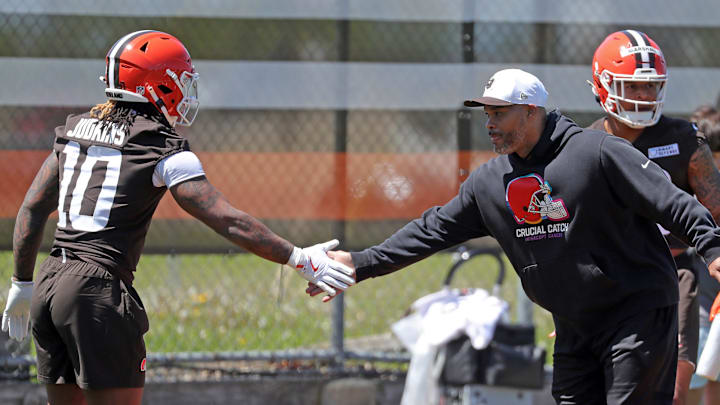 Browns running backs coach Duce Staley, right, works with running back Quinshon Judkins, May 9, 2025, in Berea.