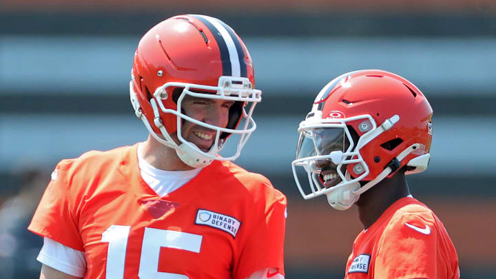 Quarterbacks Joe Flacco, left, and Shedeur Sanders
