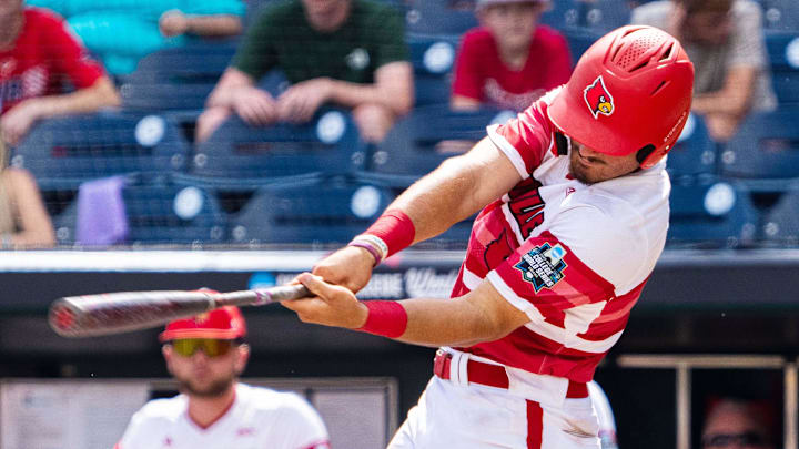 Jun 18, 2025; Omaha, Neb, USA; Louisville Cardinals first baseman Tague Davis (13) strikes out against the Coastal Carolina Chanticleers during the eighth inning at Charles Schwab Field. Mandatory Credit: Dylan Widger-Imagn Images Jun 18, 2025; Omaha, Neb, USA; Louisville Cardinals first baseman Tague Davis (13) strikes out against the Coastal Carolina Chanticleers during the eighth inning at Charles Schwab Field. Mandatory Credit: Dylan Widger-Imagn Images
