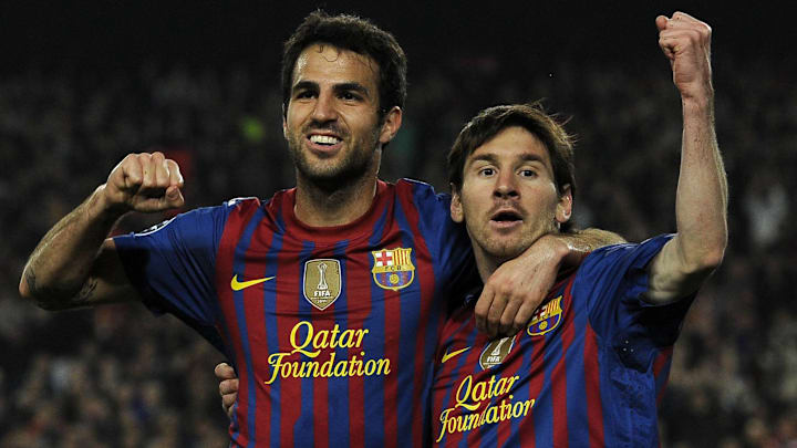 Cesc Fàbregas (left) played 123 games alongside Lionel Messi for Barcelona.