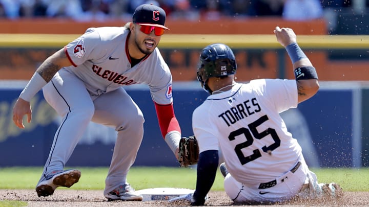 May 25, 2025; Detroit, Michigan, USA;  Cleveland Guardians third base Will Wilson (7) tags Detroit Tigers second base Gleyber Torres (25) out at second in the second inning at Comerica Park. Mandatory Credit: Rick Osentoski-Imagn Images