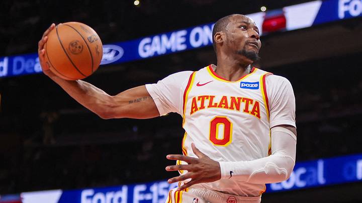 Mar 1, 2026; Atlanta, Georgia, USA; Atlanta Hawks forward Jonathan Kuminga (0) dunks against the Portland Trail Blazers in the fourth quarter at State Farm Arena. Mandatory Credit: Brett Davis-Imagn Images