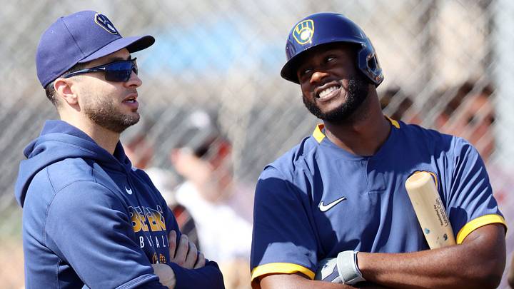 Brewers outfielders Ryan Braun (left) and Lorenzo Cain chat while waiting their turns to take live batting practice.
Ryan Braun Lorenzo Cain Brewers outfielders Ryan Braun (left) and Lorenzo Cain chat while waiting their turns to take live batting practice.
Ryan Braun Lorenzo Cain