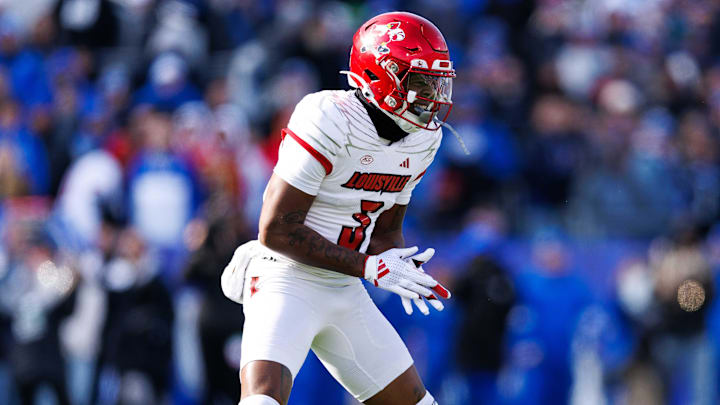 Nov 30, 2024; Lexington, Kentucky, USA; Louisville Cardinals wide receiver Caullin Lacy (5) celebrates during the game against the Kentucky Wildcats at Kroger Field. Mandatory Credit: Jordan Prather-Imagn Images
