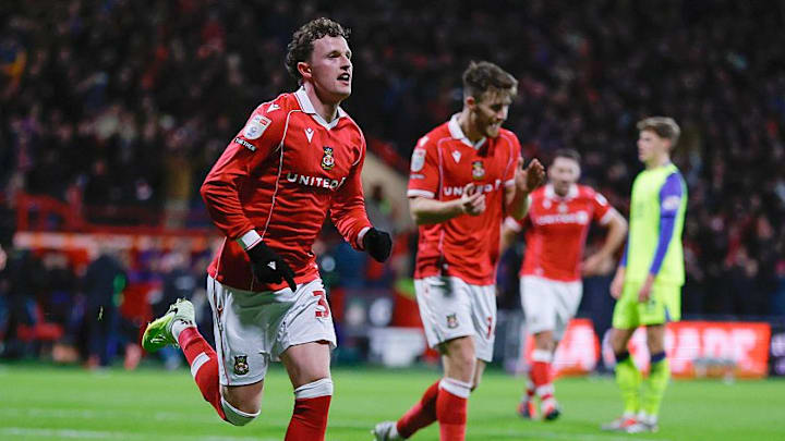 Nathan Broadhead (left) got Wrexham on the scoresheet just before half-time. Nathan Broadhead (left) got Wrexham on the scoresheet just before half-time.