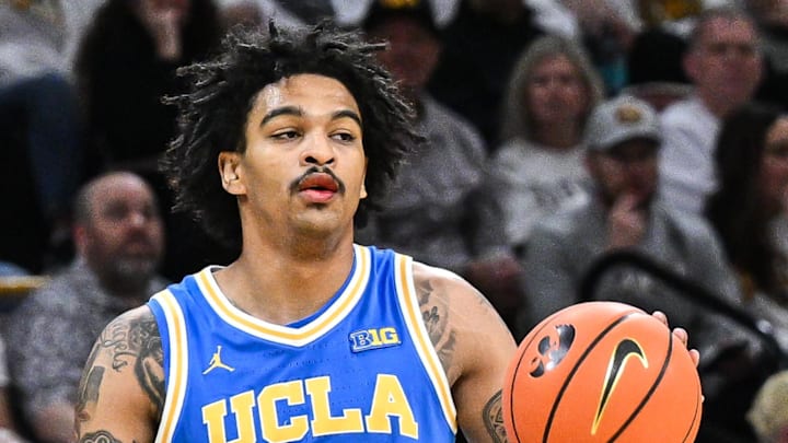 Jan 3, 2026; Iowa City, Iowa, USA; UCLA Bruins guard Skyy Clark (55) controls the ball against the Iowa Hawkeyes during the first half at Carver-Hawkeye Arena. Mandatory Credit: Jeffrey Becker-Imagn Images Jan 3, 2026; Iowa City, Iowa, USA; UCLA Bruins guard Skyy Clark (55) controls the ball against the Iowa Hawkeyes during the first half at Carver-Hawkeye Arena. Mandatory Credit: Jeffrey Becker-Imagn Images