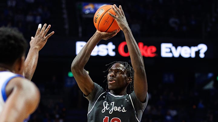 Nov 20, 2023; Lexington, Kentucky, USA; Saint Joseph's Hawks forward Rasheer Fleming (13) shoots the ball during the first half against the Kentucky Wildcats at Rupp Arena at Central Bank Center. Mandatory Credit: Jordan Prather-Imagn Images