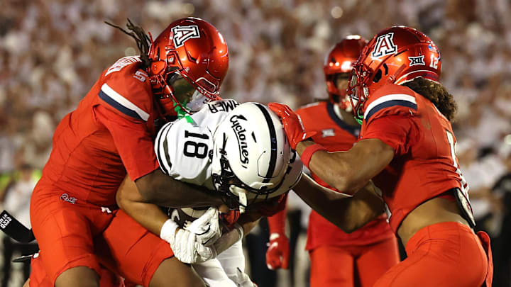 Sep 27, 2025; Ames, Iowa, USA; Iowa State Cyclones tight end Benjamin Brahmer (18) catches a pass in front of Arizona Wildcats defensive back Marquis Groves-Killebrew (5) during the first half at Jack Trice Stadium. Mandatory Credit: Reese Strickland-Imagn Images