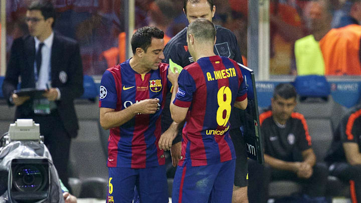 Iniesta souhaite bonne chance à Xavi
