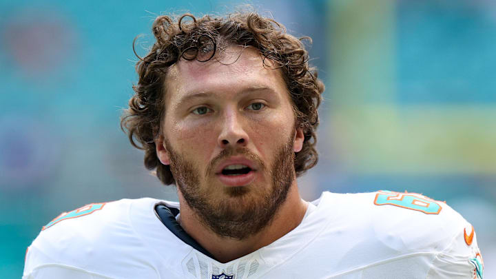 Sep 14, 2025; Miami Gardens, Florida, USA; Miami Dolphins guard Cole Strange (69) looks on before a game against the New England Patriots at Hard Rock Stadium. Mandatory Credit: Nathan Ray Seebeck-Imagn Images
