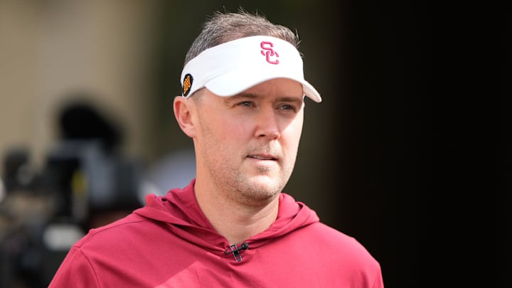 Sep 10, 2022; Stanford, California, USA; USC Trojans head coach Lincoln Riley walks out of the tunnel for warmups before the start of the first quarter against the Stanford Cardinal at Stanford Stadium. Mandatory Credit: Stan Szeto-Imagn Images Sep 10, 2022; Stanford, California, USA; USC Trojans head coach Lincoln Riley walks out of the tunnel for warmups before the start of the first quarter against the Stanford Cardinal at Stanford Stadium. Mandatory Credit: Stan Szeto-Imagn Images