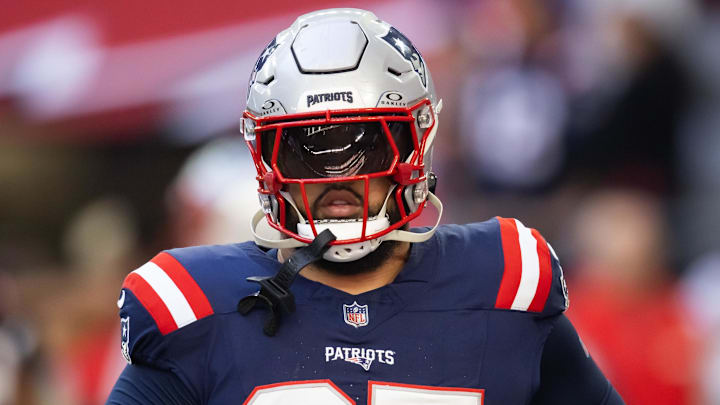 Dec 15, 2024; Glendale, Arizona, USA; New England Patriots defensive tackle Daniel Ekuale (95) against the Arizona Cardinals at State Farm Stadium. Mandatory Credit: Mark J. Rebilas-Imagn Images