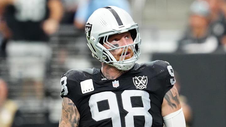 Sep 22, 2024; Paradise, Nevada, USA; Las Vegas Raiders defensive end Maxx Crosby (98) celebrates after getting a sack against the Carolina Panthers during the second quarter at Allegiant Stadium. Mandatory Credit: Stephen R. Sylvanie-Imagn Images