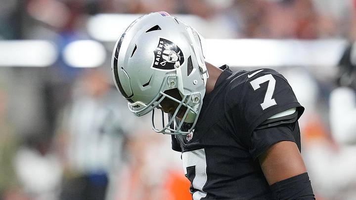 Nov 23, 2025; Paradise, Nevada, USA; Las Vegas Raiders quarterback Geno Smith (7) reacts after failing to convert against the Cleveland Browns during the fourth quarter at Allegiant Stadium. Mandatory Credit: Stephen R. Sylvanie-Imagn Images