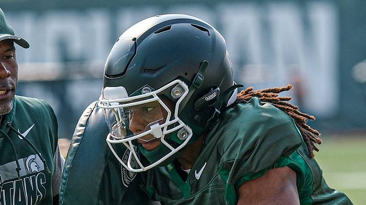 Michigan State's Rodney Bullard Jr. (3) is blocked at a practice with pads at the Michigan State practice field Tuesday, Aug. 5, 2025. Michigan State's Rodney Bullard Jr. (3) is blocked at a practice with pads at the Michigan State practice field Tuesday, Aug. 5, 2025.