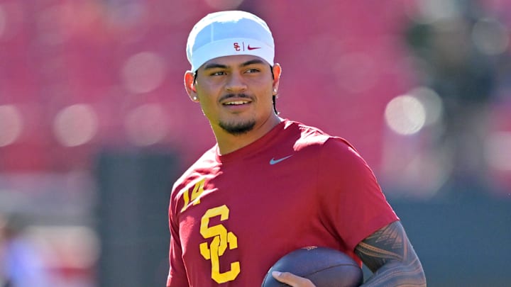Oct 11, 2025; Los Angeles, California, USA;  USC Trojans quarterback Jayden Maiava (14) warms up prior to the game against the Michigan Wolverines at United Airlines Field at the Los Angeles Memorial Coliseum. Mandatory Credit: Jayne Kamin-Oncea-Imagn Images