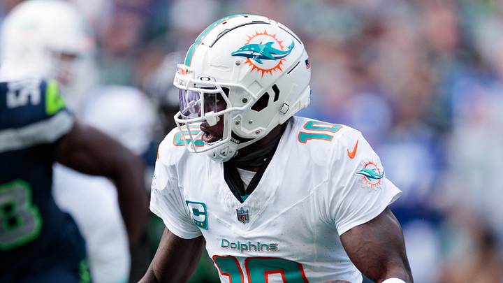 Sep 22, 2024; Seattle, Washington, USA; Miami Dolphins wide receiver Tyreek Hill (10) runs with the ball during the third quarter against Seattle Seahawks at Lumen Field. Mandatory Credit: Kevin Ng-Imagn Images Sep 22, 2024; Seattle, Washington, USA; Miami Dolphins wide receiver Tyreek Hill (10) runs with the ball during the third quarter against Seattle Seahawks at Lumen Field. Mandatory Credit: Kevin Ng-Imagn Images