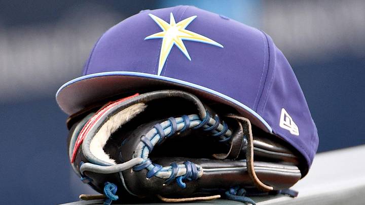 May 14, 2018; Kansas City, MO, USA; A general view of a Tampa Bay Rays hat and glove on the dugout fence before the game against the Kansas City Royals at Kauffman Stadium.
