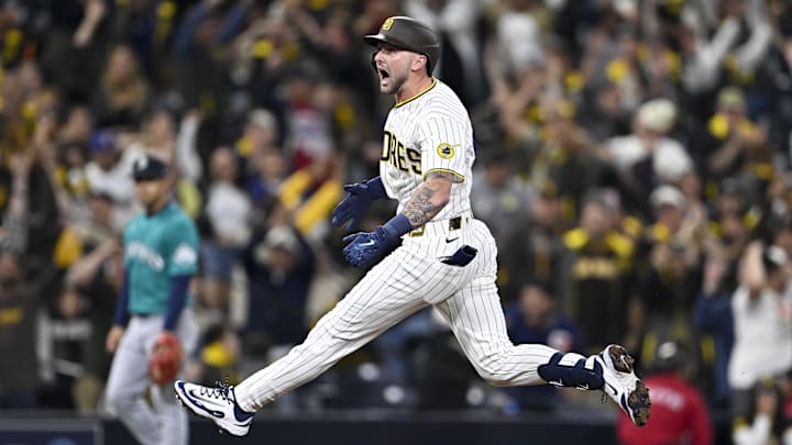 Apr 15, 2026; San Diego, California, USA; San Diego Padres center fielder Jackson Merrill celebrates after hitting a walk-off double during the ninth inning against the Seattle Mariners at Petco Park. All MLB players are wearing number 42 today to honor Jackie Robinson. Mandatory Credit: Denis Poroy-Imagn Images