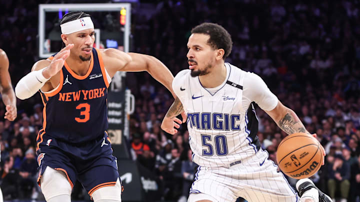 Jan 6, 2025; New York, New York, USA; Orlando Magic guard Cole Anthony (50) looks to drive past New York Knicks guard Josh Hart (3) in the fourth quarter at Madison Square Garden. Mandatory Credit: Wendell Cruz-Imagn Images