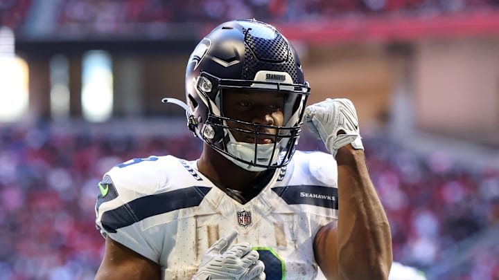 Oct 20, 2024; Atlanta, Georgia, USA; Seattle Seahawks running back Kenneth Walker III (9) celebrates after a touchdown catch against the Atlanta Falcons in the third quarter at Mercedes-Benz Stadium. Mandatory Credit: Brett Davis-Imagn Images
