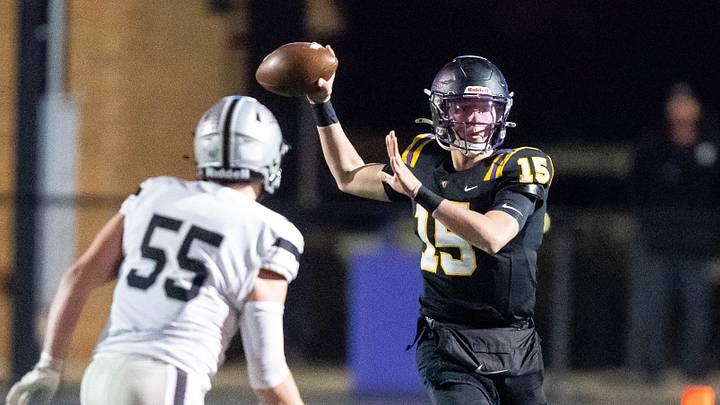 Johnston's Trevin Helming (15) looks to throw on Oct. 31, 2025, at Johnston High School.