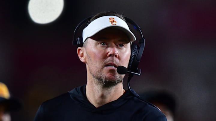 Nov 7, 2025; Los Angeles, California, USA; Southern California Trojans head coach Lincoln Riley watches game action against the Northwestern Wildcats during the second half at the Los Angeles Memorial Coliseum. Mandatory Credit: Gary A. Vasquez-Imagn Images Nov 7, 2025; Los Angeles, California, USA; Southern California Trojans head coach Lincoln Riley watches game action against the Northwestern Wildcats during the second half at the Los Angeles Memorial Coliseum. Mandatory Credit: Gary A. Vasquez-Imagn Images