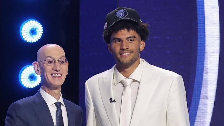 Jun 23, 2026; New York, NY, USA; NBA commissioner Adam Silver greets the third pick in the 2026 NBA draft, Duke forward Cameron Boozer after he was selected by the Memphis Grizzlies at Barclays Center. Mandatory Credit: Brad Penner-Imagn Images