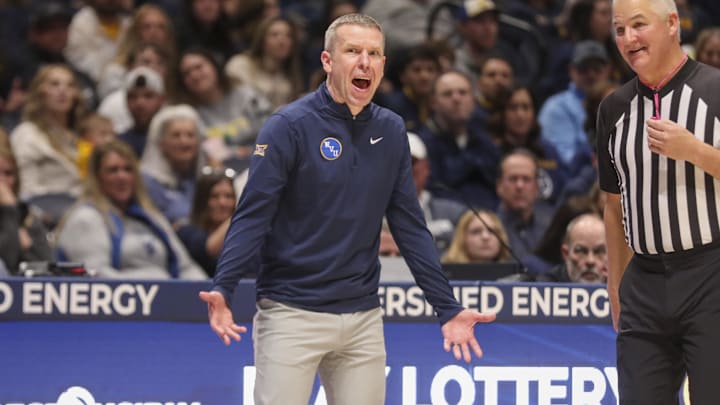 Jan 31, 2026; Morgantown, West Virginia, USA; West Virginia Mountaineers head coach Ross Hodge argues a call during the second half against the Baylor Bears at Hope Coliseum. Mandatory Credit: Ben Queen-Imagn Images