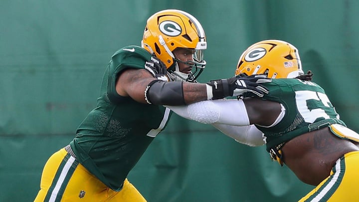 Green Bay Packers defensive end Micah Parsons works against Brenton Cox at practice on Wednesday.
