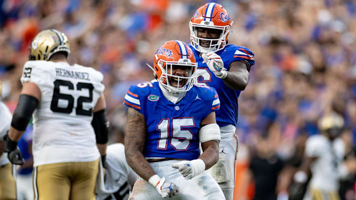 Florida Gators linebacker Derek Wingo (15) celebrates with Florida Gators linebacker Shemar James (6) after a quarterback sack during the second half against the Vanderbilt Commodores at Steve Spurrier Field at Ben Hill Griffin Stadium in Gainesville, FL on Saturday, October 7, 2023. [Matt Pendleton/Gainesville Sun]