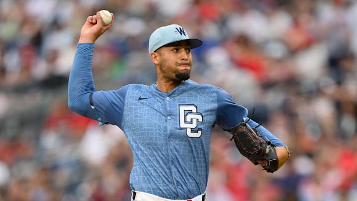 Mar 29, 2025; Washington, District of Columbia, USA; Washington Nationals pitcher Orlando Ribalta (64) throws a pitch during the seventh inning against the Philadelphia Phillies at Nationals Park. 