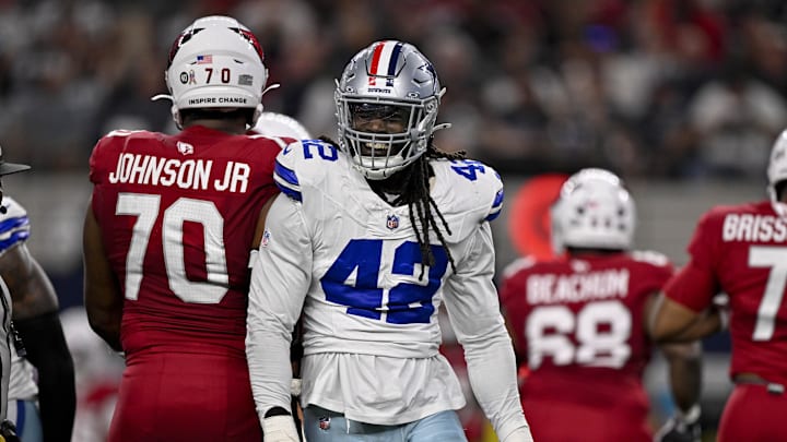 Nov 3, 2025; Arlington, Texas, USA; Dallas Cowboys defensive end Jadeveon Clowney (42) celebrates after he sacks Arizona Cardinals quarterback Jacoby Brissett (7) during the game between the Dallas Cowboys and the Arizona Cardinals at AT&T Stadium. Mandatory Credit: Jerome Miron-Imagn Images