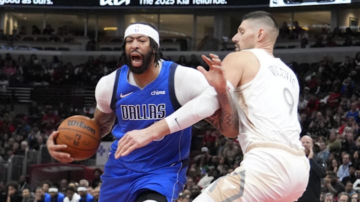Mar 29, 2025; Chicago, Illinois, USA; Chicago Bulls center Nikola Vucevic (9) defends Dallas Mavericks forward Anthony Davis (3) during the second half at United Center. Mandatory Credit: David Banks-Imagn Images Mar 29, 2025; Chicago, Illinois, USA; Chicago Bulls center Nikola Vucevic (9) defends Dallas Mavericks forward Anthony Davis (3) during the second half at United Center. Mandatory Credit: David Banks-Imagn Images