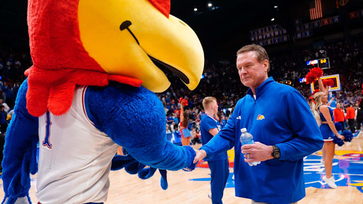 Kansas Jayhawks head coach Bill Self shakes hands with Big Jay after defeating Houston Cougars in the game inside Allen Fieldhouse on Monday, Feb. 23, 2026. Kansas Jayhawks head coach Bill Self shakes hands with Big Jay after defeating Houston Cougars in the game inside Allen Fieldhouse on Monday, Feb. 23, 2026.
