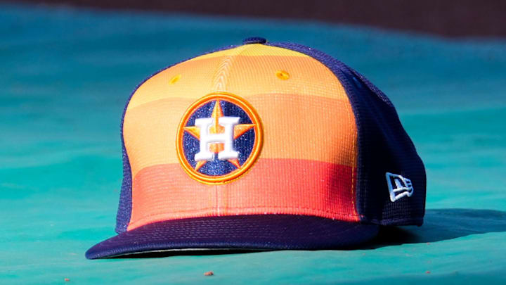 Apr 9, 2024; Kansas City, Missouri, USA; A general view of Houston Astros second base Jose Altuve (27) hat on the field during batting practice prior to a game against the Kansas City Royals at Kauffman Stadium.