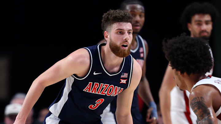 Dec 13, 2025; Birmingham, Alabama, USA; Arizona Wildcats guard Anthony Dell'Orso (3) guards Alabama Crimson Tide guard Labaron Philon (0) during the second half at Legacy Arena at BJCC. Mandatory Credit: David Leong-Imagn Images