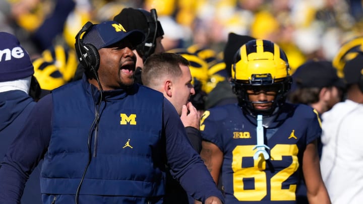 Nov 25, 2023; Ann Arbor, Michigan, USA; Michigan Wolverines wide receivers coach Ron Bellamy yells from the sideline during the NCAA football game against the Ohio State Buckeyes at Michigan Stadium. Nov 25, 2023; Ann Arbor, Michigan, USA; Michigan Wolverines wide receivers coach Ron Bellamy yells from the sideline during the NCAA football game against the Ohio State Buckeyes at Michigan Stadium.